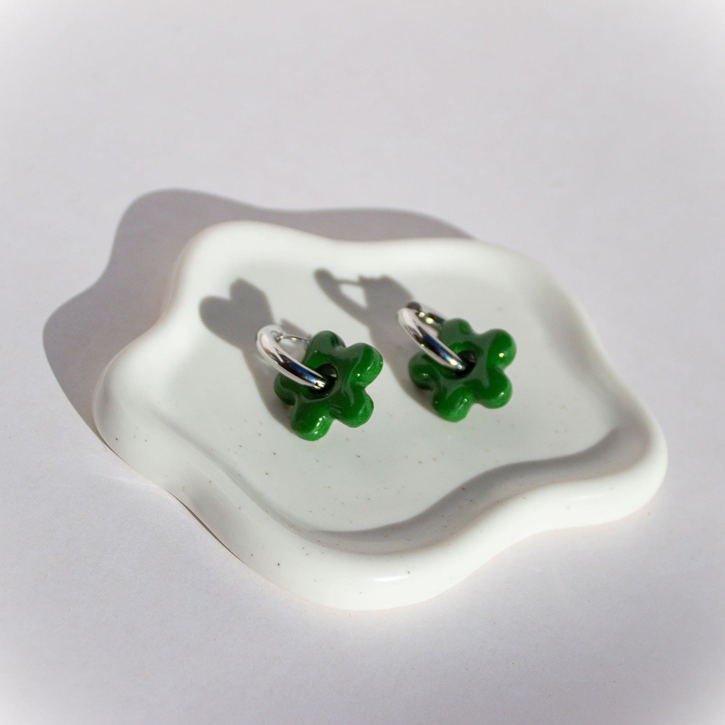 Aros Flor Jade Silver escenario