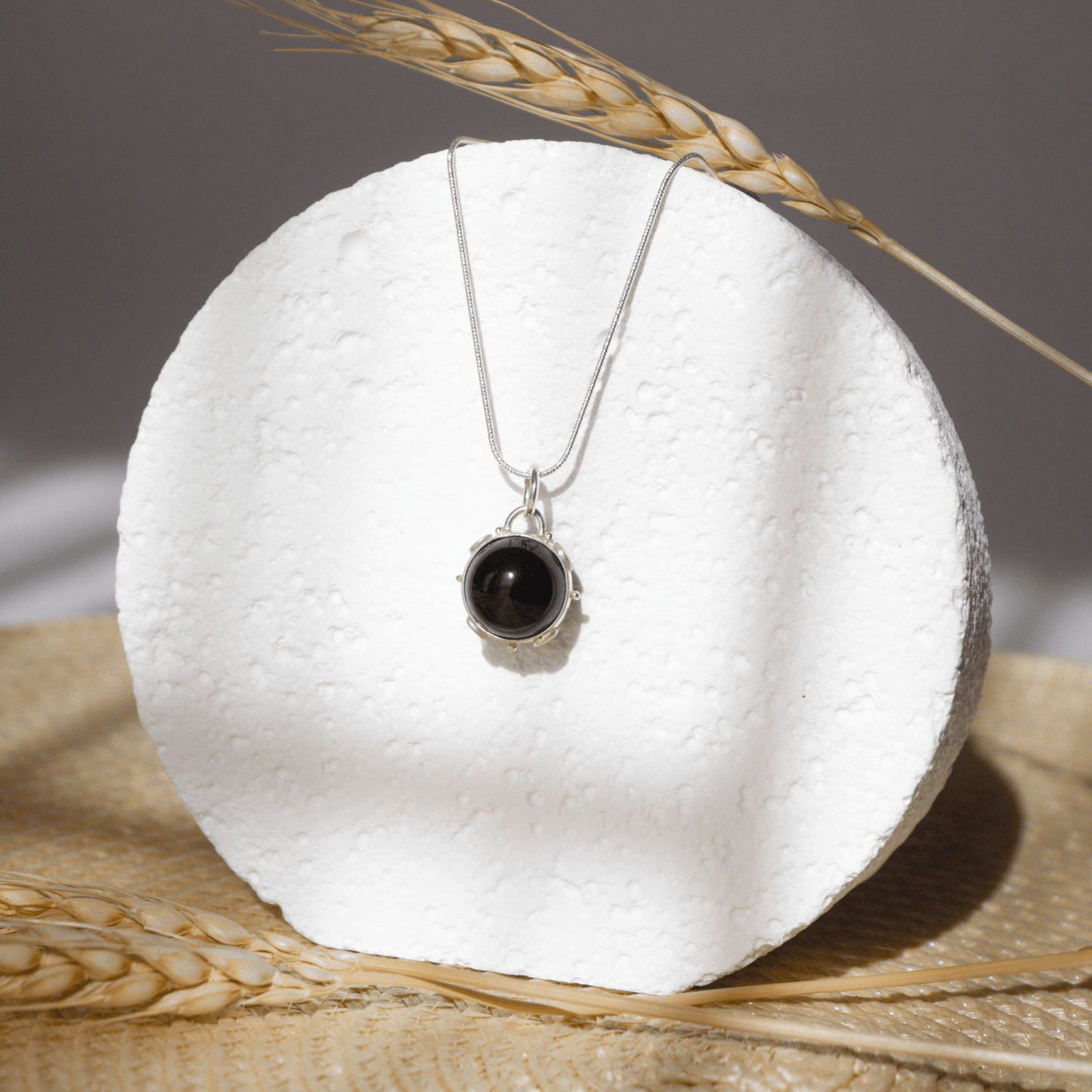 Collar Esfera Universo escenario