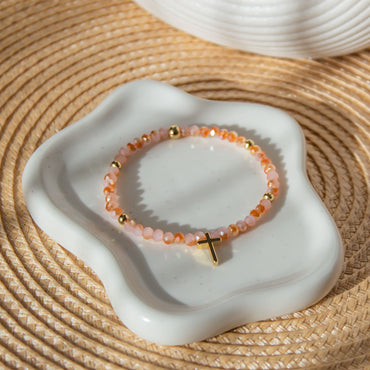 Escenario Pulsera Cruz de Coral