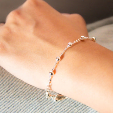 Pulsera Plata925 Cruz y esferas modelo