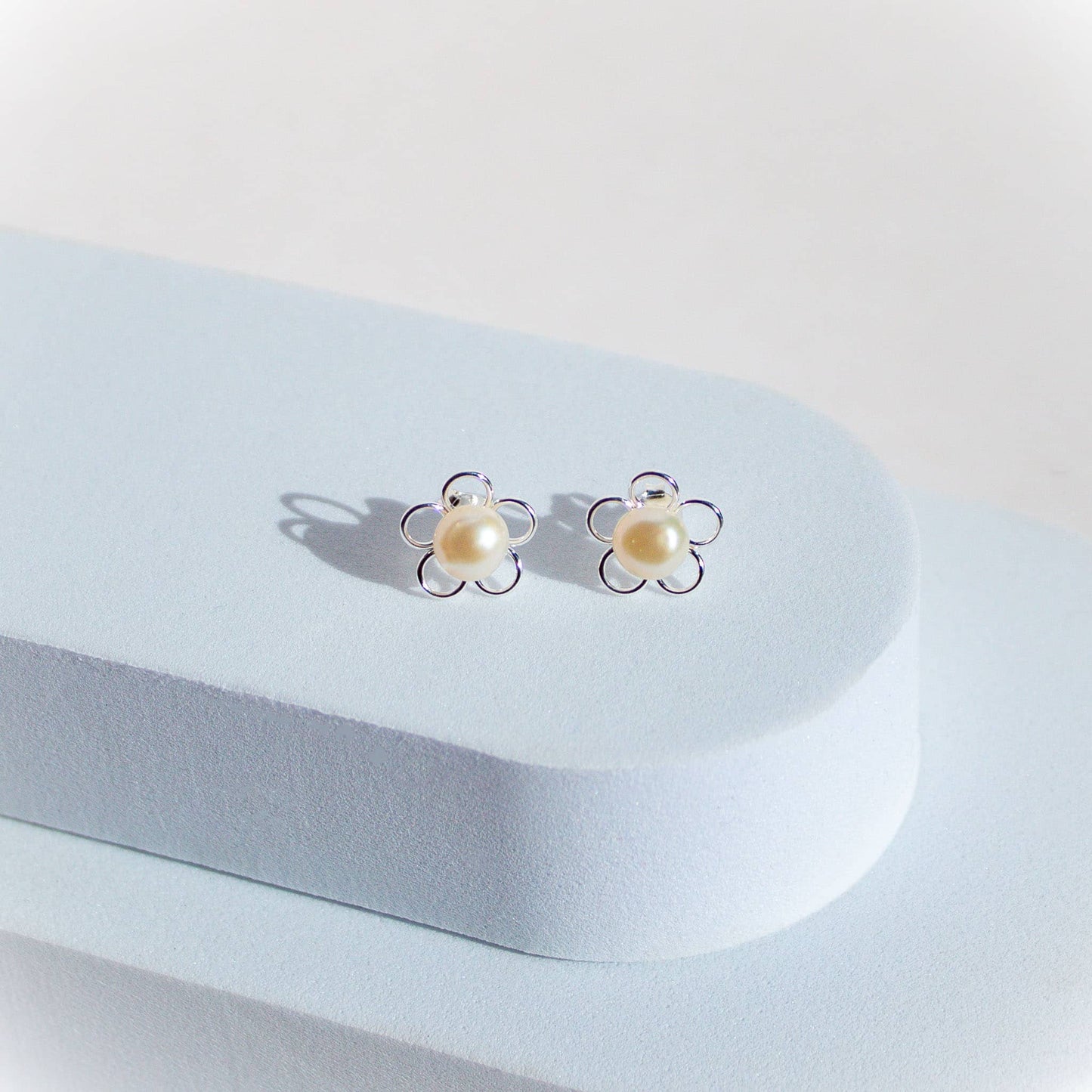 Aros Flor de Perla Escenario