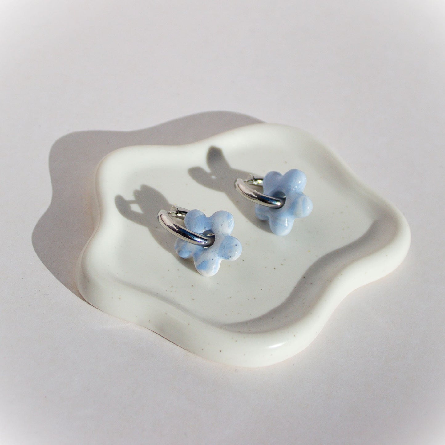 Aros Flor Marina Silver escenario