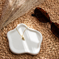 Collar Baño Oro delfines escenario