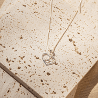 Collar Siempre Juntos escenario